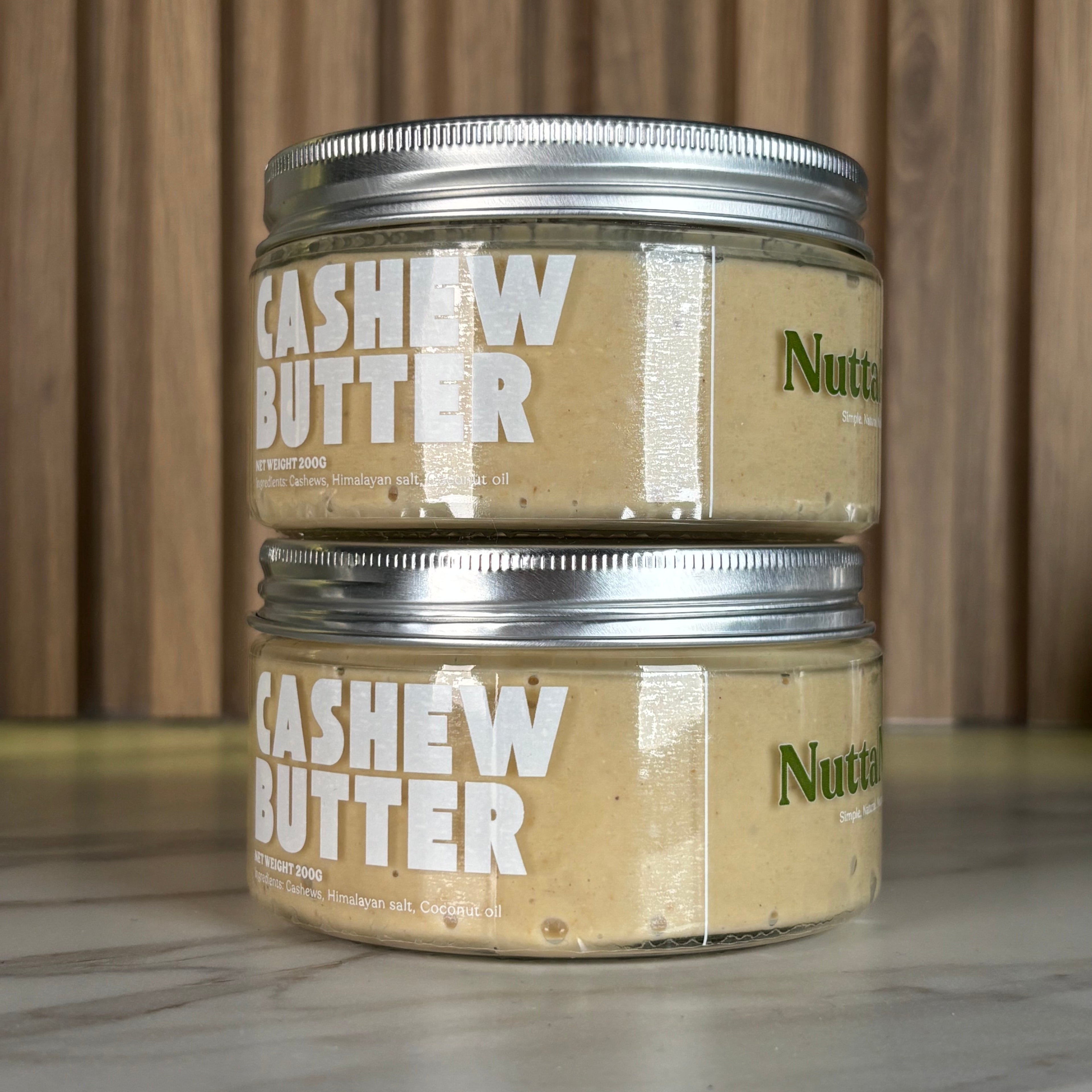 Two jars of Cashew Butter by NuttaNut, healthy nut butter in Indonesia. Selai kacang mede yang sehat di Indonesia, bisa kirim same day delivery jakarta, surabaya, cirebon